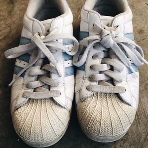 Blue and white adidas